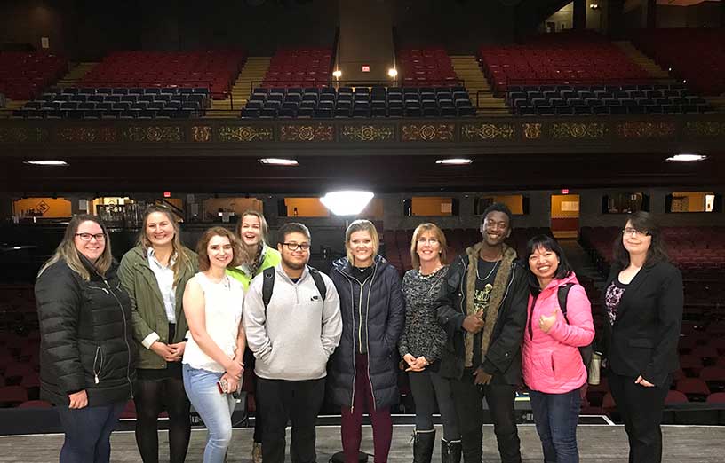 theatre-group-photo-at-auditorium