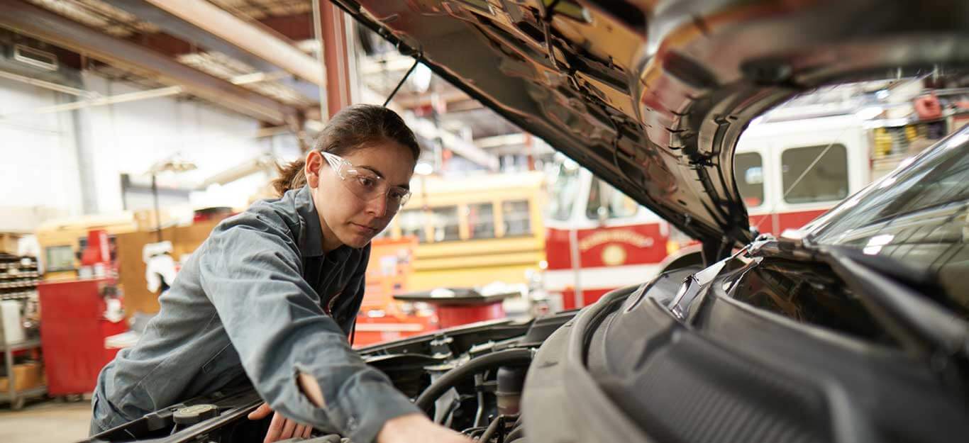 auto-tech-professional-working-on-car