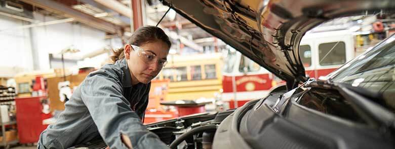 auto-tech-professional-working-on-car