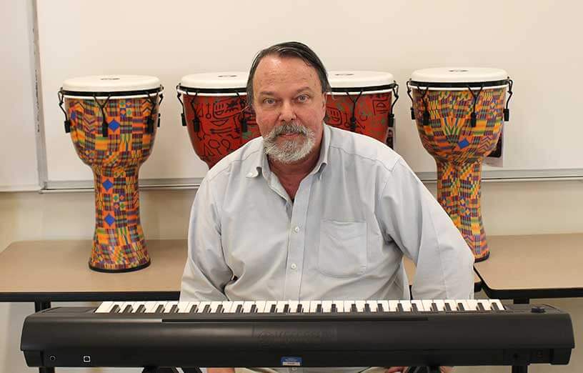SMCC-professor-Rich-Pitre-with-keyboard-and-drums
