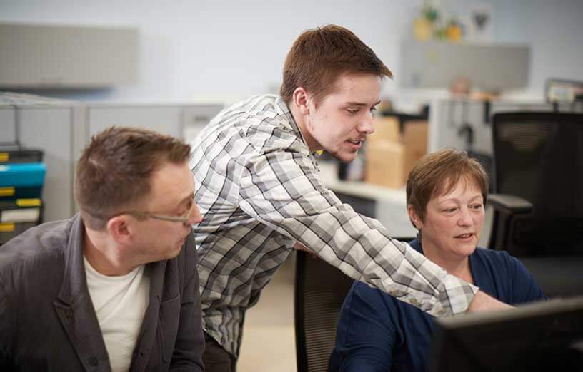 IT-students-working-together-on-computer-project-SMCC-Maine