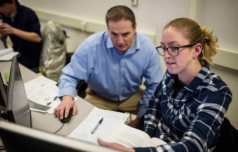 Student-Architectural-Engineering-working-with-instructor