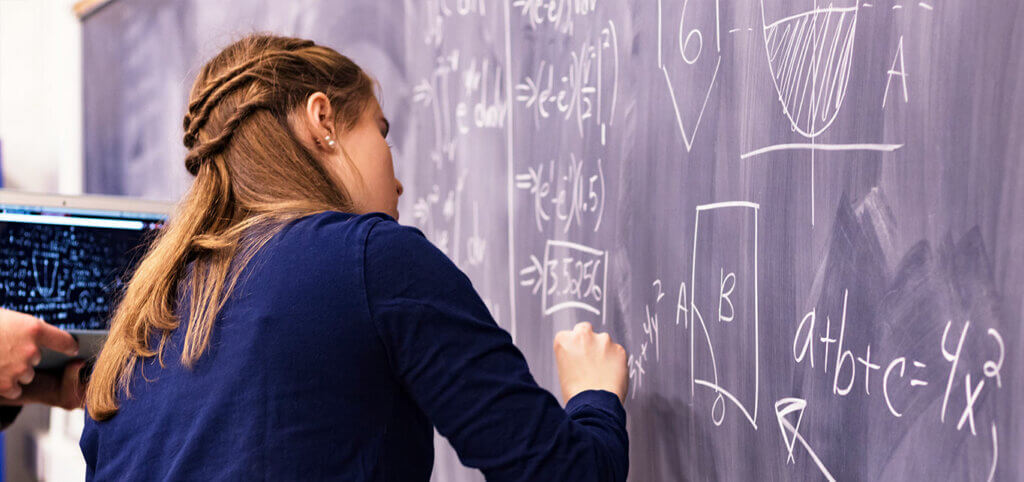 math-student-writing-equations-on-chalkboard