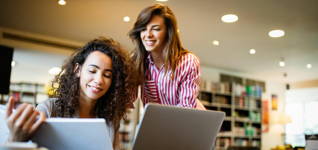 professional-women-studying-with-laptop