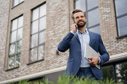 property-manager-taking-business-call-with-a-smile