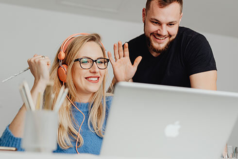 two-professionals-with-laptop