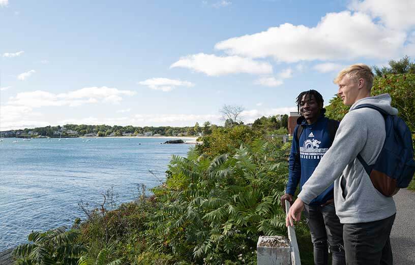 smcc-students-on-campus-by-the-ocean-with-seawolves-logo-hoodie